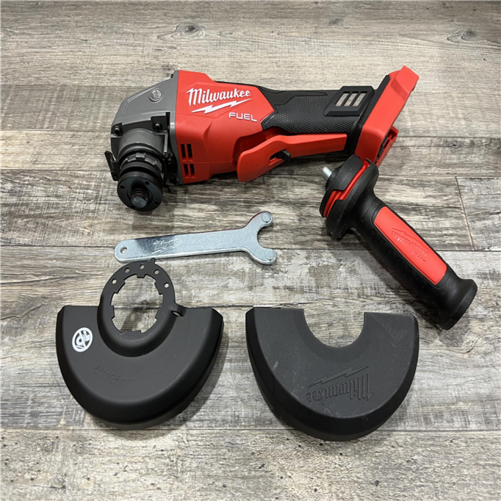 AS-IS Milwaukee FUEL 18V Lithium-Ion Brushless Cordless 4-1/2 in./5 in. Grinder w/Paddle Switch (Tool-Only)