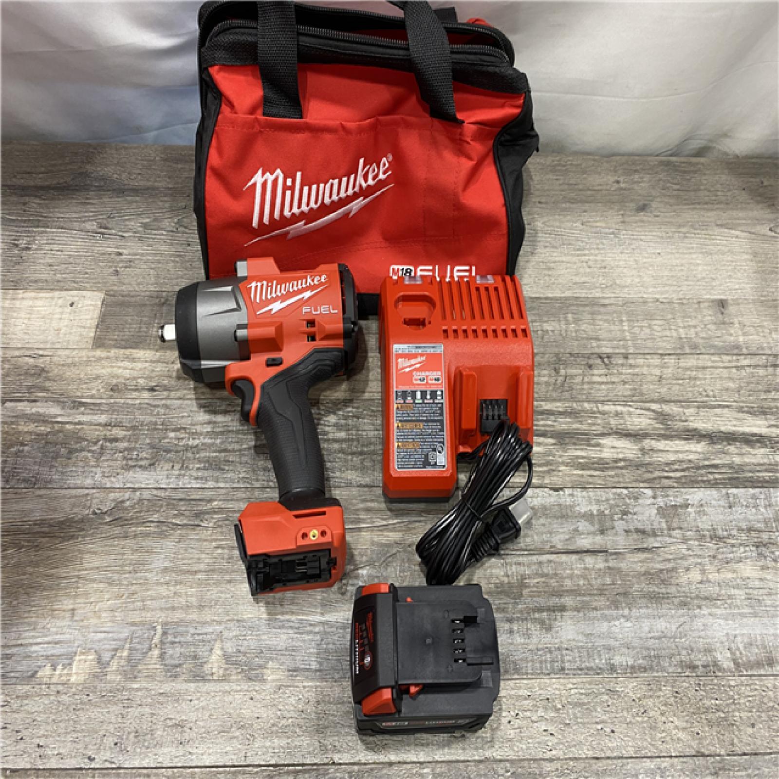 AS-IS Milwaukee FUEL 18V Lithium-Ion Brushless Cordless 1/2 in. Impact Wrench w/Friction Ring Kit