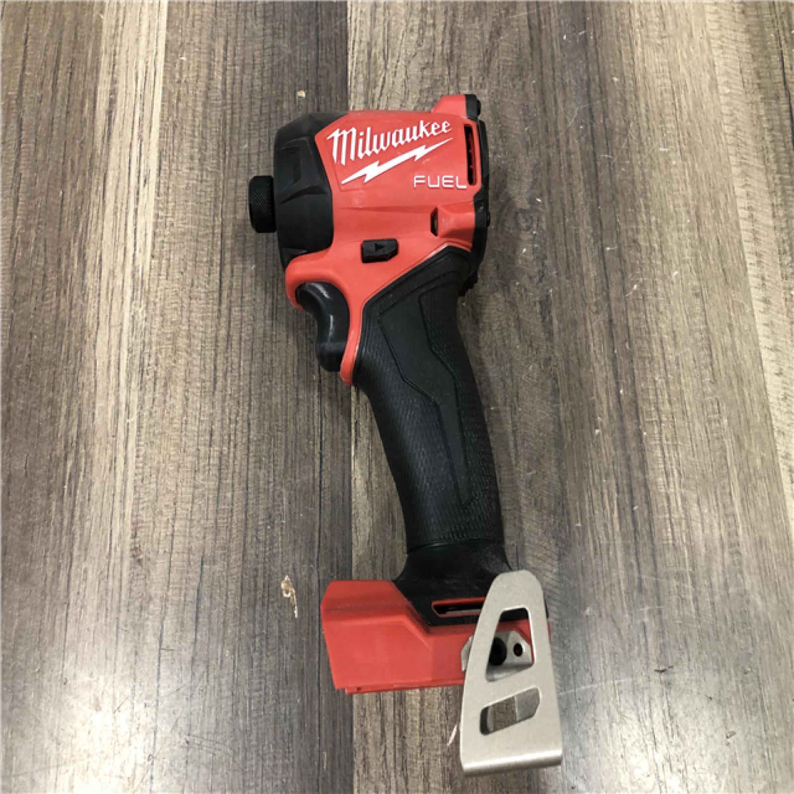 AS-IS Milwaukee FUEL SURGE 18V Lithium-Ion Brushless Cordless 1/4 in. Hex Impact Driver (Tool-Only)
