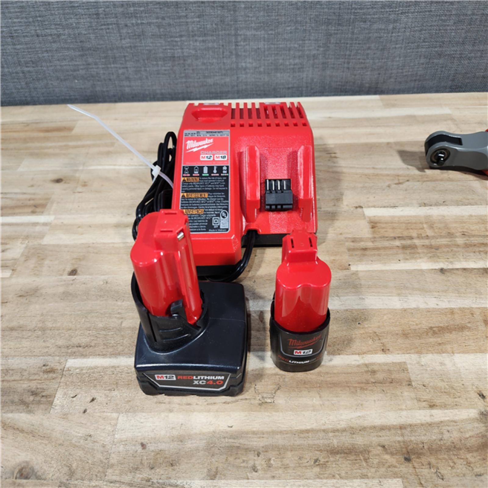 HOUSTON LOCATION - AS-IS MILWAUKEE 3 TOOL COMBO KIT W/ (2) BATTERY & CHARGER