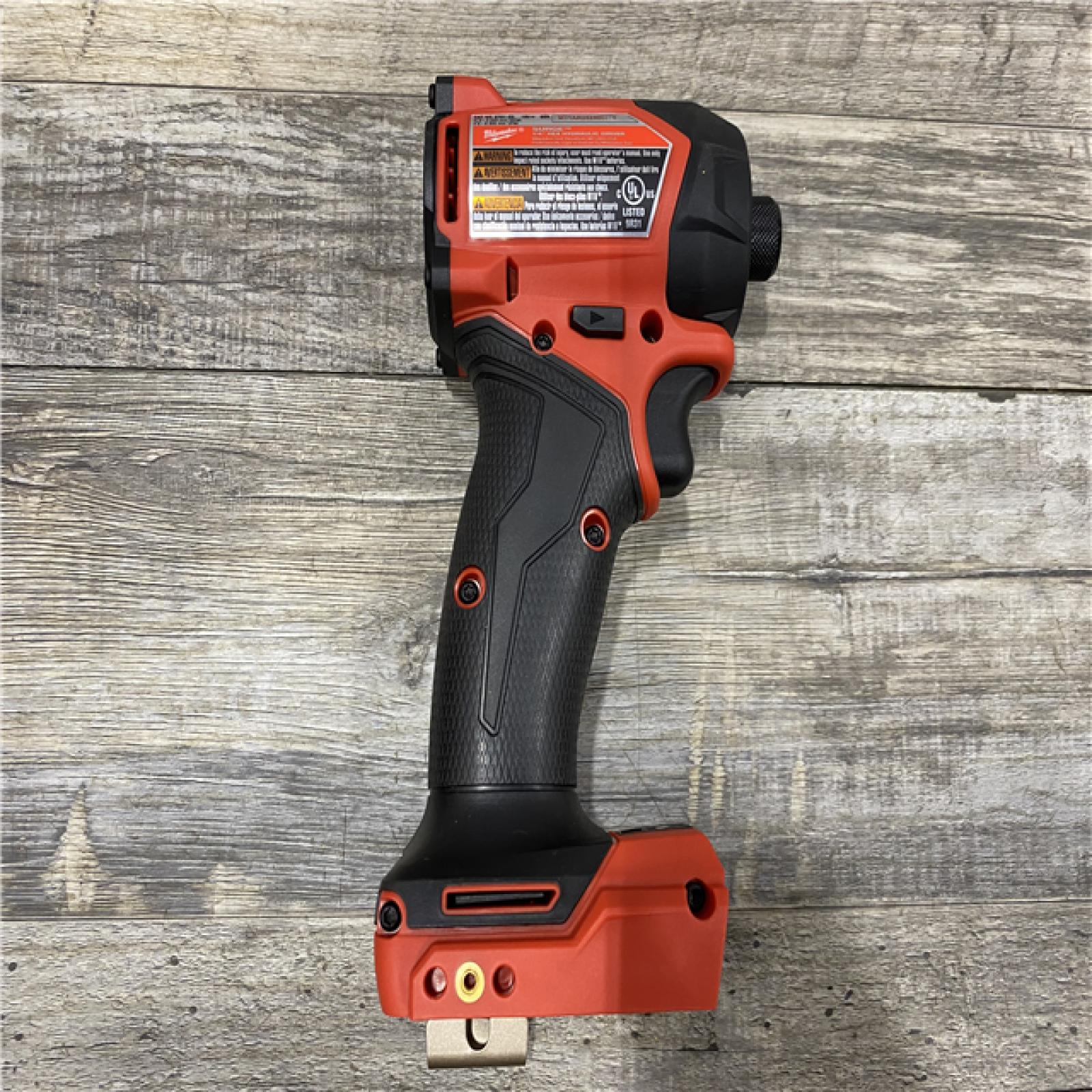 AS-IS Milwaukee FUEL SURGE 18V Lithium-Ion Brushless Cordless 1/4 in. Hex Impact Driver with (2) 5.0 Ah Battery and Charger
