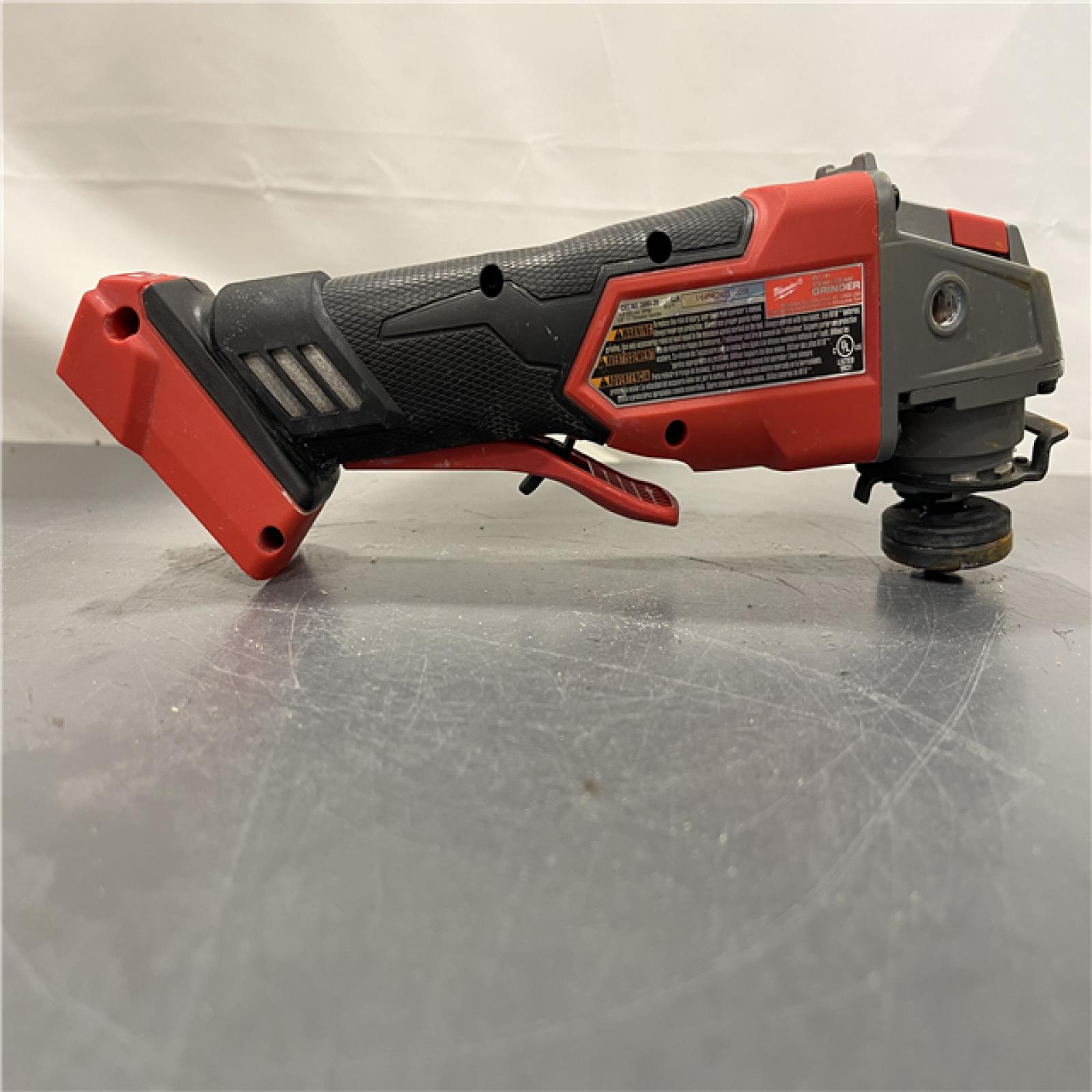 AS-IS - Milwaukee FUEL 18-Volt Lithium-Ion Brushless Cordless 4-1/2 in./5 in. Grinder W/Paddle Switch (Tool-Only)