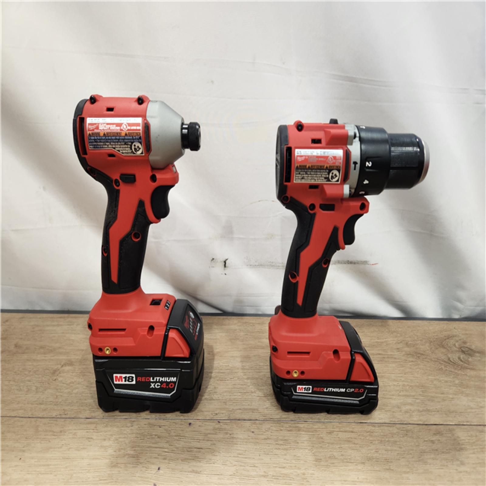 AS-IS- M18 18-Volt Lithium-Ion Brushless Cordless Compact Hammer Drill/Impact Combo Kit (2-Tool) with (2) Batteries  Bag