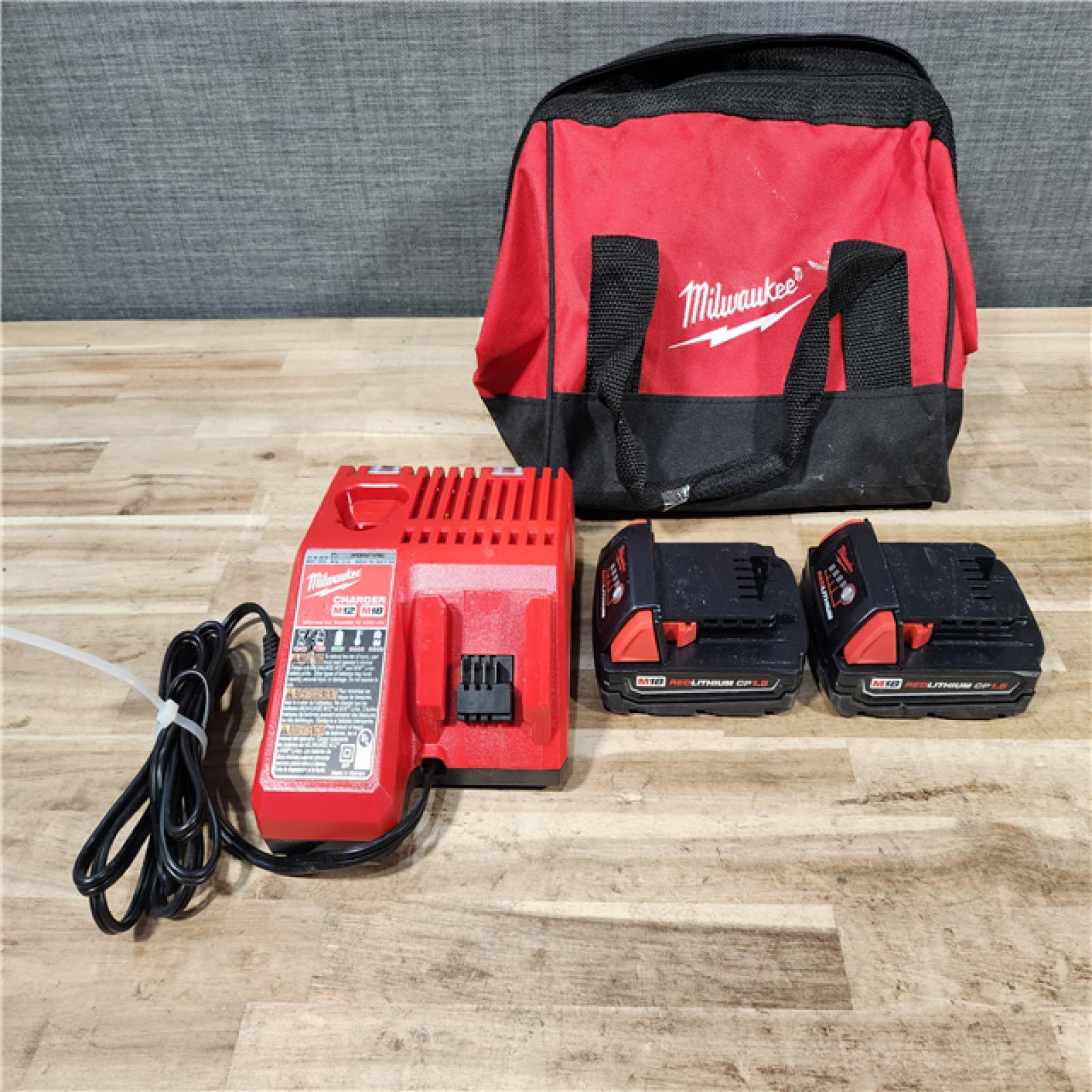 HOUSTON LOCATION - AS-IS Milwaukee 18V Lithium-Ion Cordless Drill Driver/Impact Driver Combo Kit