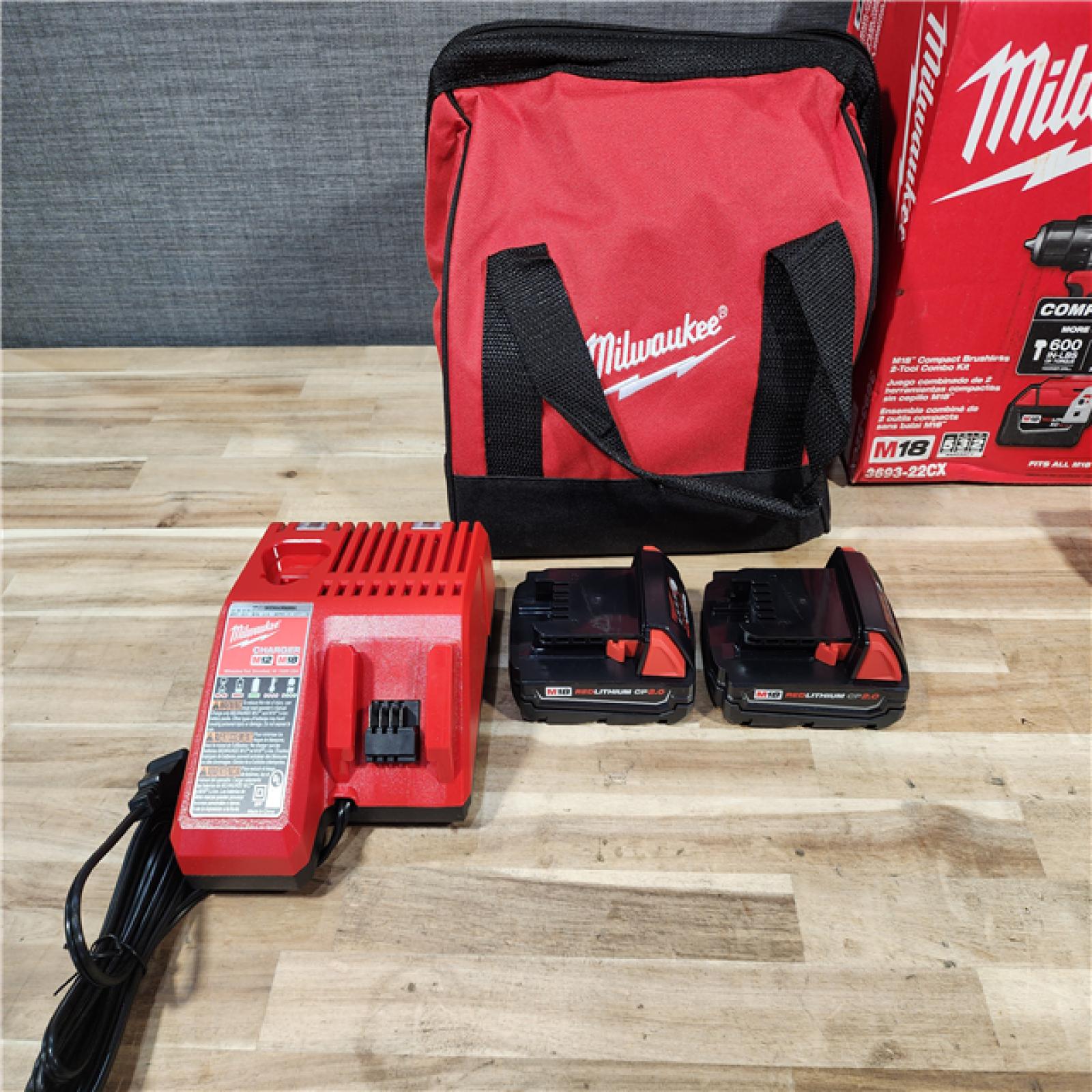 HOUSTON LOCATION - AS-IS Milwaukee 18-Volt Lithium-Ion Brushless Cordless Compact Hammer Drill/Impact Combo Kit