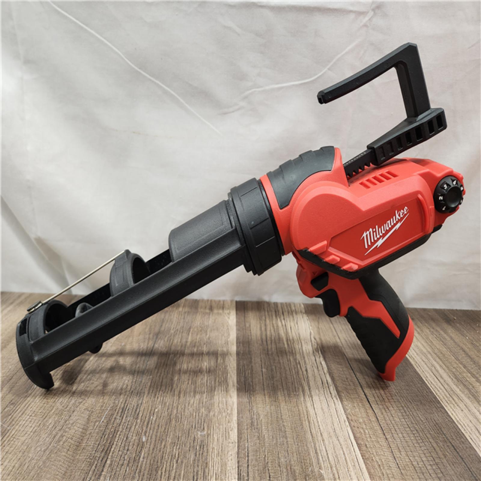 AS-IS- Milwaukee M12 12V Cordless 10oz Caulk/Adhesive Gun (Tool Only)