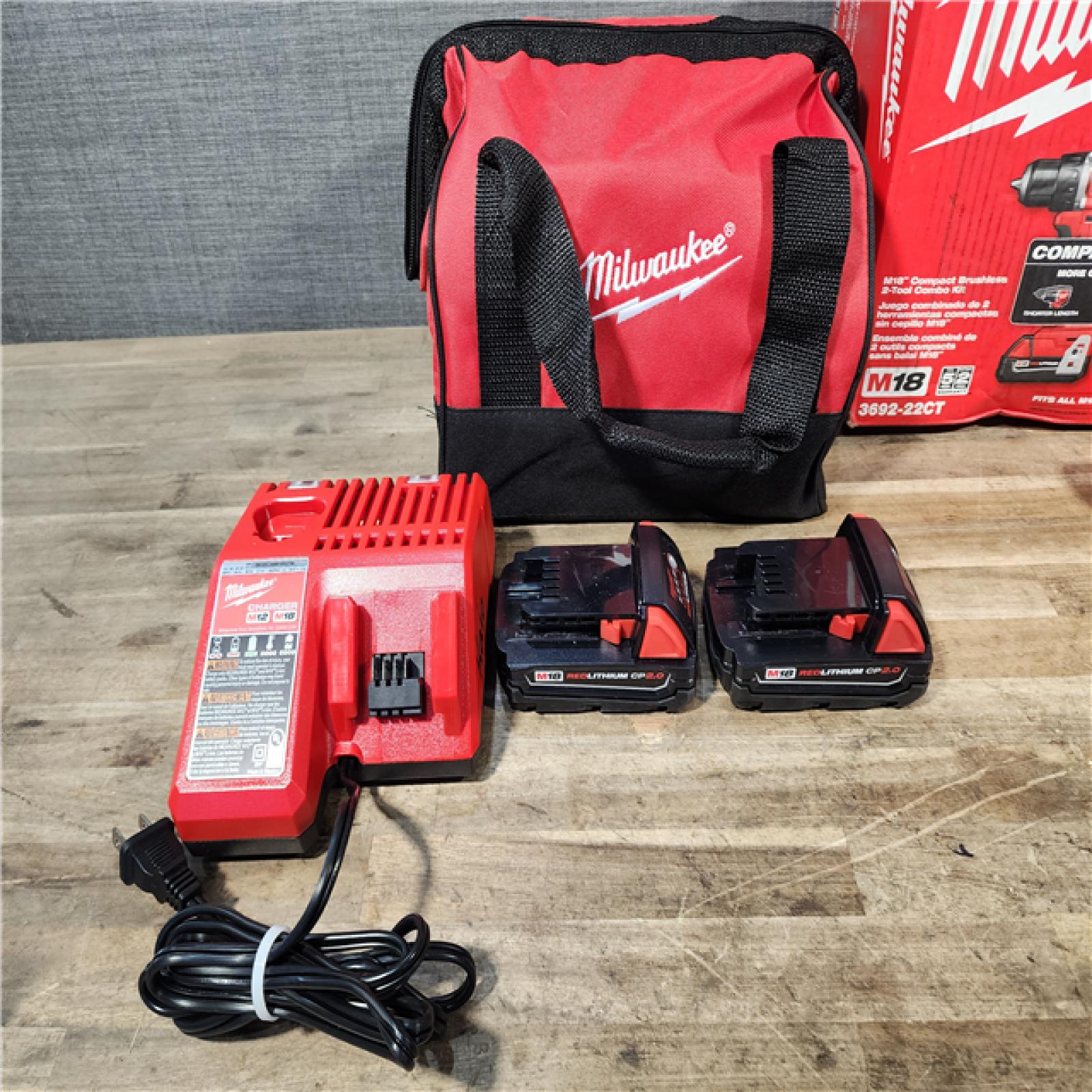 HOUSTON LOCATION - AS-IS Milwaukee M18 18V Lithium-Ion Brushless Cordless Compact Drill/Impact Combo Kit (2-Tool) W/(2) 2.0 Ah Batteries  Charger & Bag