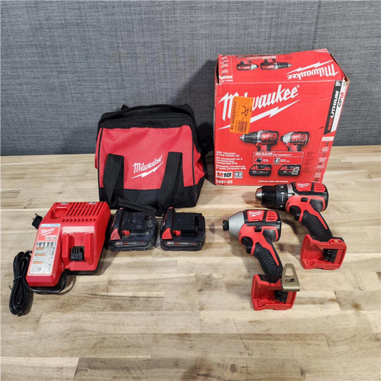 HOUSTON LOCATION - AS-IS Milwaukee M18 18V Cordless Brushed 2 Tool Drill/Driver and Impact Driver Kit