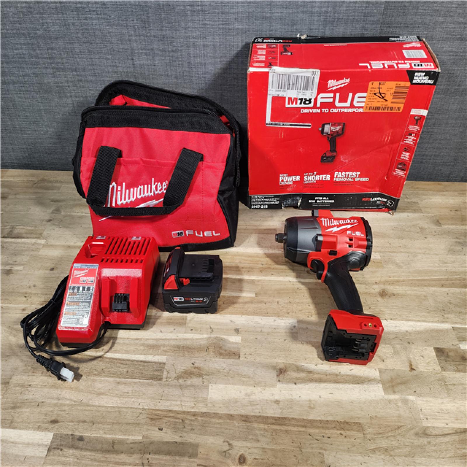 HOUSTON LOCATION - AS-IS (APPEARS LIKE NEW) Milwaukee M18 1/2 in. Cordless Brushless High Torque Impact Wrench Kit (Battery & Charger)