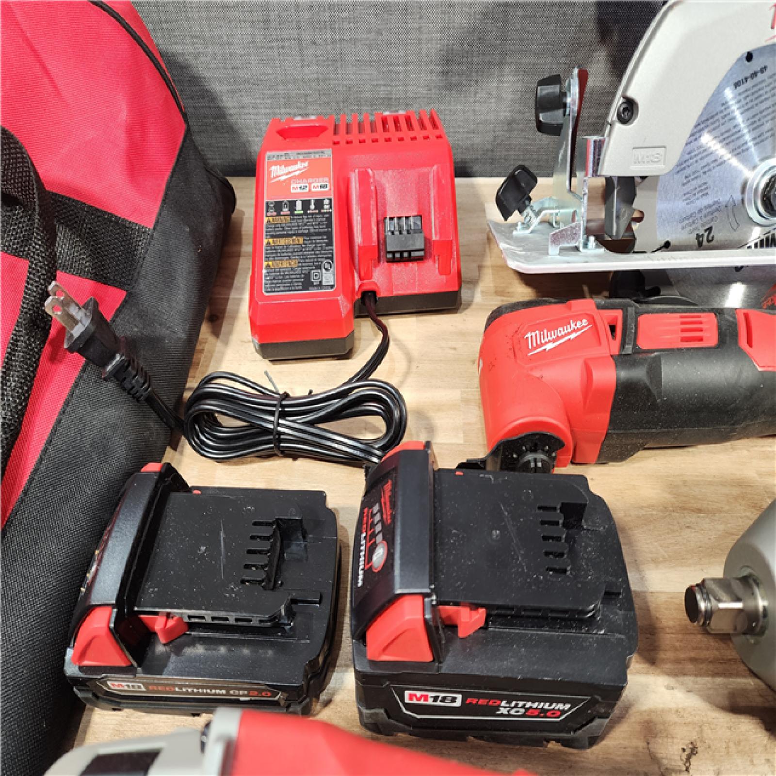 HOUSTON LOCATION - AS-IS MILWAUKEE 9 TOOL COMBO KIT W/ (2) BATTERY & CHARGER