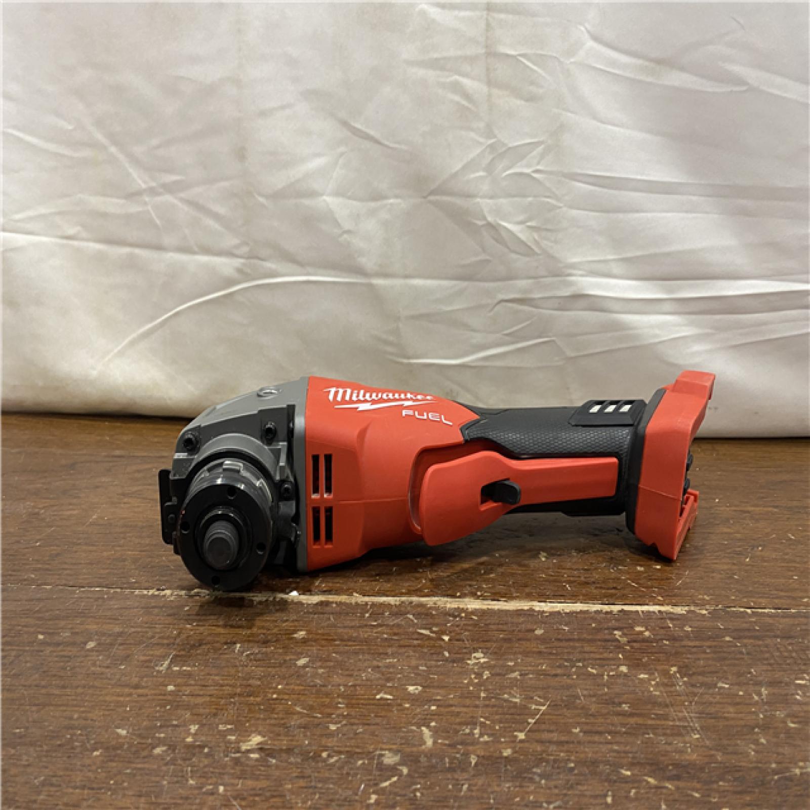 AS-IS Milwaukee 2880-20 M18 FUEL 18-Volt Lithium-Ion Brushless Cordless 4-1/2 in./5 in. Grinder W/Paddle Switch (Tool-Only)