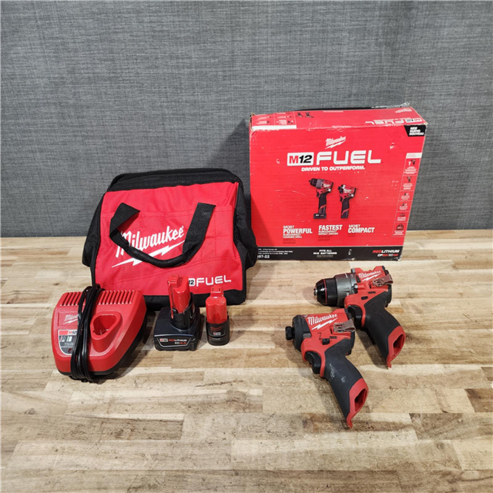 HOUSTON LOCATION - AS-IS Milwaukee FUEL 12-Volt Lithium-Ion Brushless Cordless Hammer Drill and Impact Driver Combo Kit