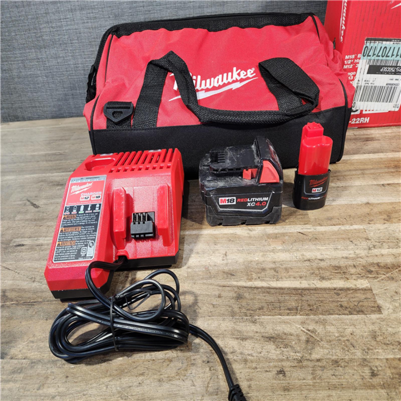 HOUSTON LOCATION - AS-IS Milwaukee 12/18V Lithium-Ion Cordless 3/8 in. Ratchet and 1/2 in. High Torque Impact Wrench with Friction Ring Combo Kit