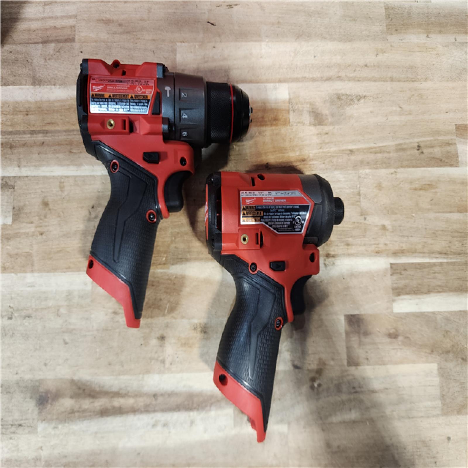 HOUSTON LOCATION - AS-IS Milwaukee  FUEL 12-Volt Lithium-Ion Brushless Cordless Hammer Drill and Impact Driver Combo Kit