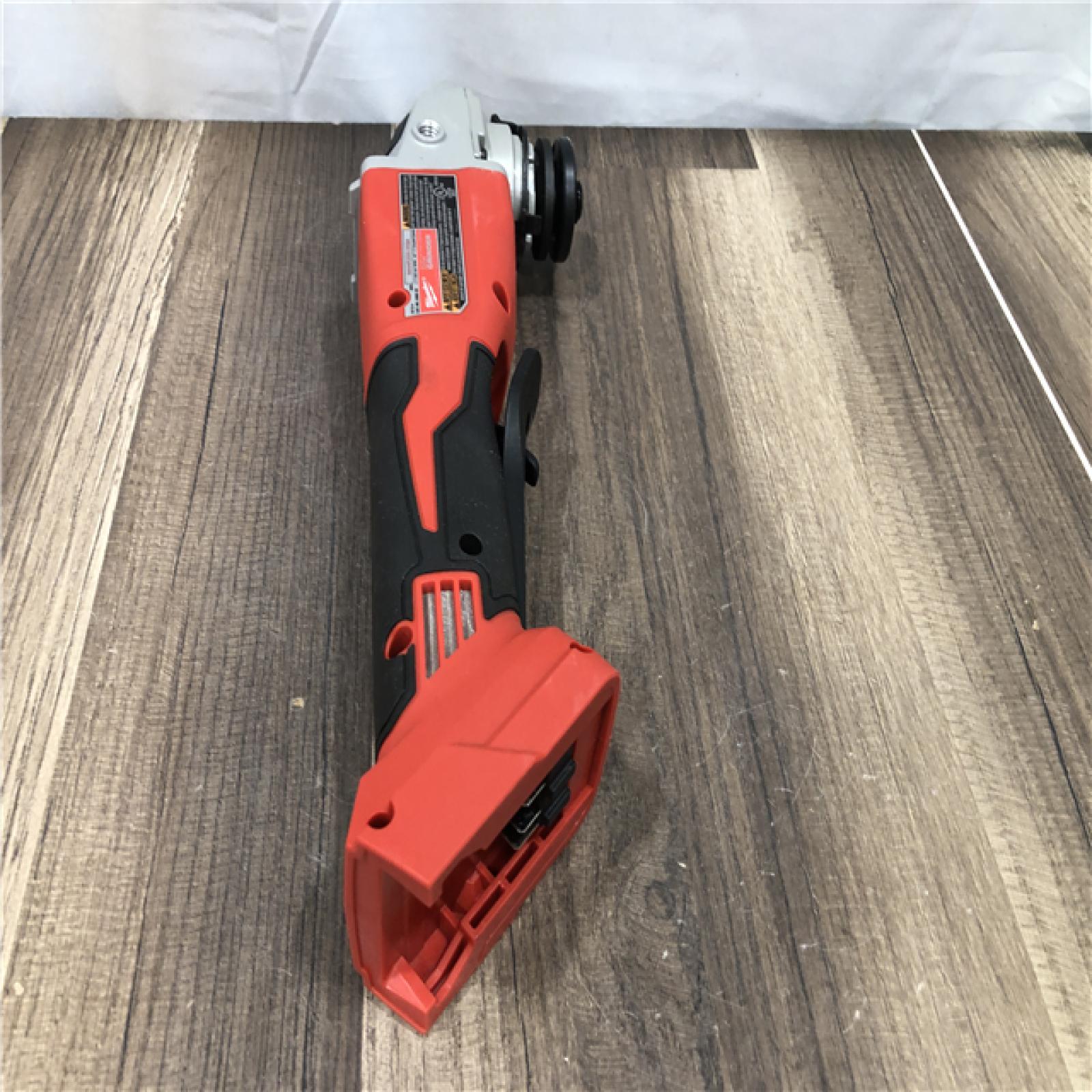 AS-IS Milwaukee 18V Lithium-Ion Brushless Cordless 4-1/2 in./5 in. Grinder w/Paddle Switch (Tool-Only)