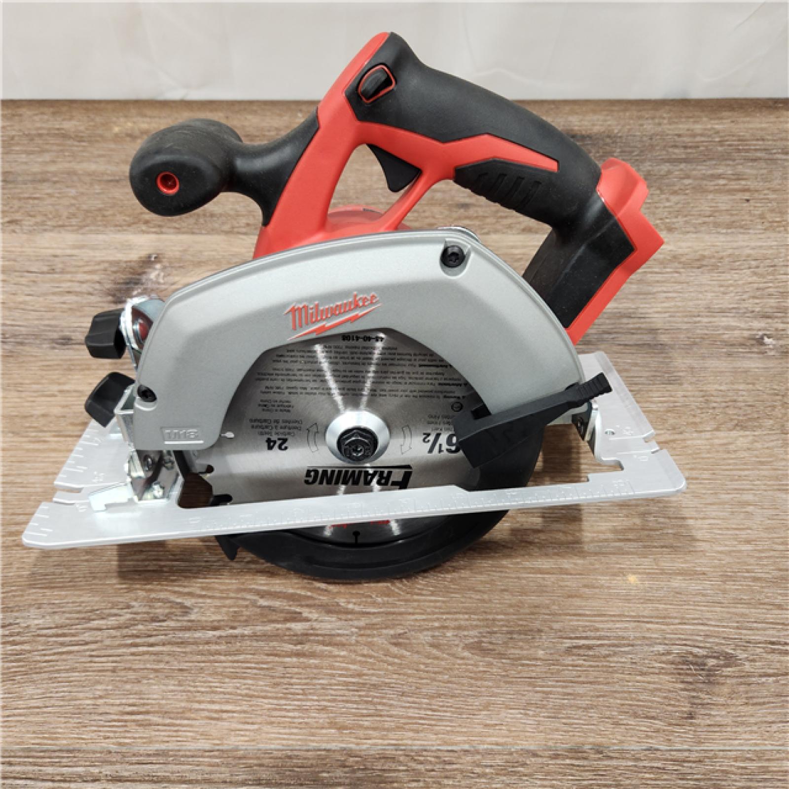 AS-IS Milwaukee M18 18V Lithium-Ion Cordless 6-1/2 in. Circular Saw with M18 Starter Kit One 5.0Ah Battery and Charger