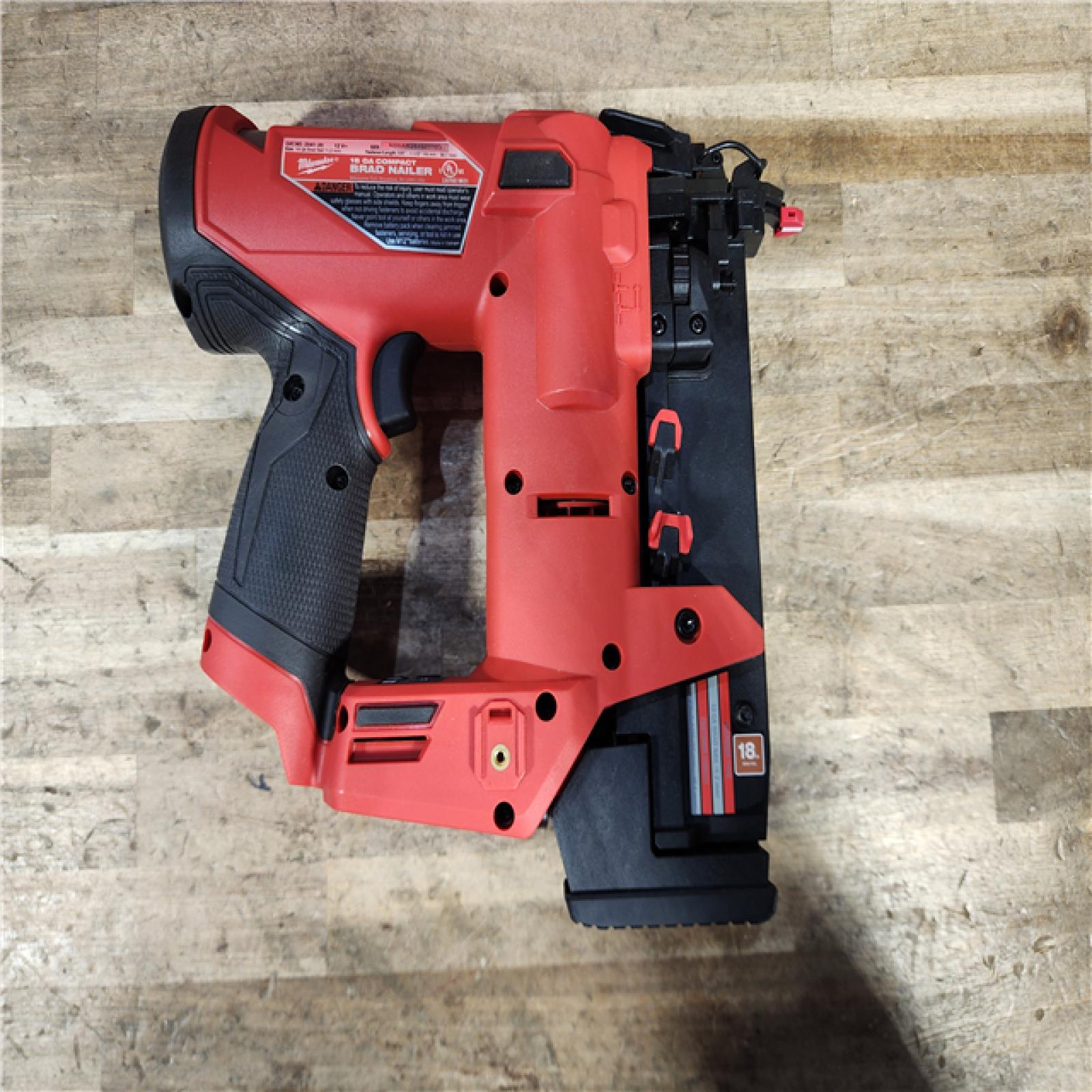 HOUSTON LOCATION - AS-IS Milwaukee FUEL 12-Volt Lithium-Ion Brushless Cordless 18-Gauge 1-1/2 in. Compact Brad Nailer (Tool Only)