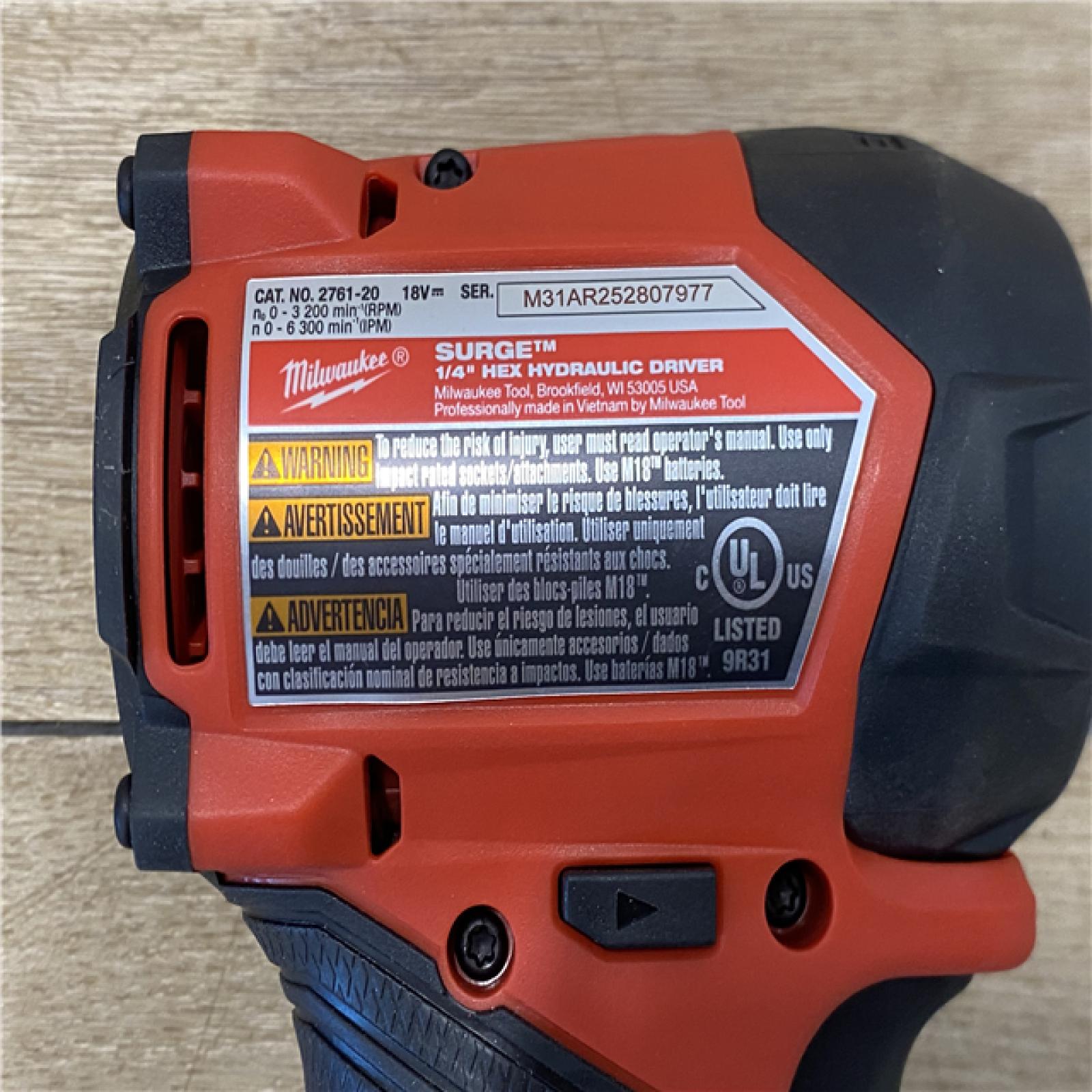 AS-IS Milwaukee FUEL SURGE 18V Lithium-Ion Brushless Cordless 1/4 in. Hex Impact Driver (Tool-Only)