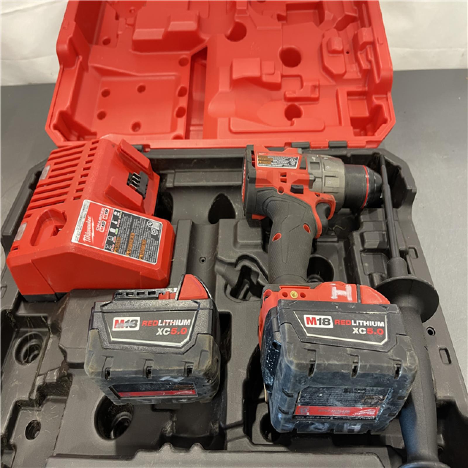 AS-IS - Milwaukee M18 FUEL 18-Volt Lithium-Ion Brushless Cordless 1/2 in. Hammer Drill/Driver Kit