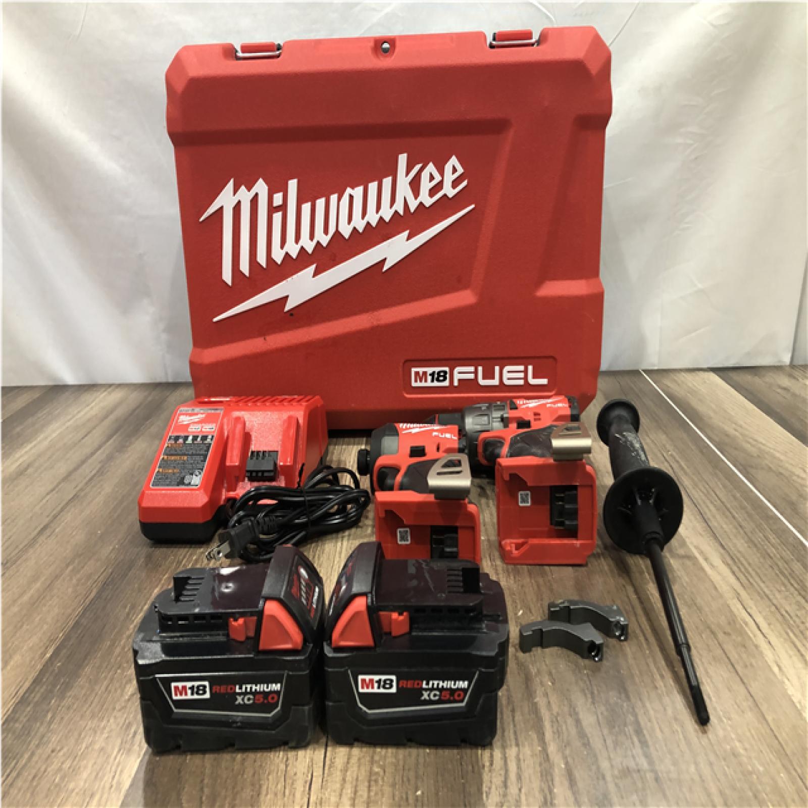 AS-IS Milwaukee FUEL 18V Lithium-Ion Brushless Cordless Hammer Drill and Impact Driver Combo Kit