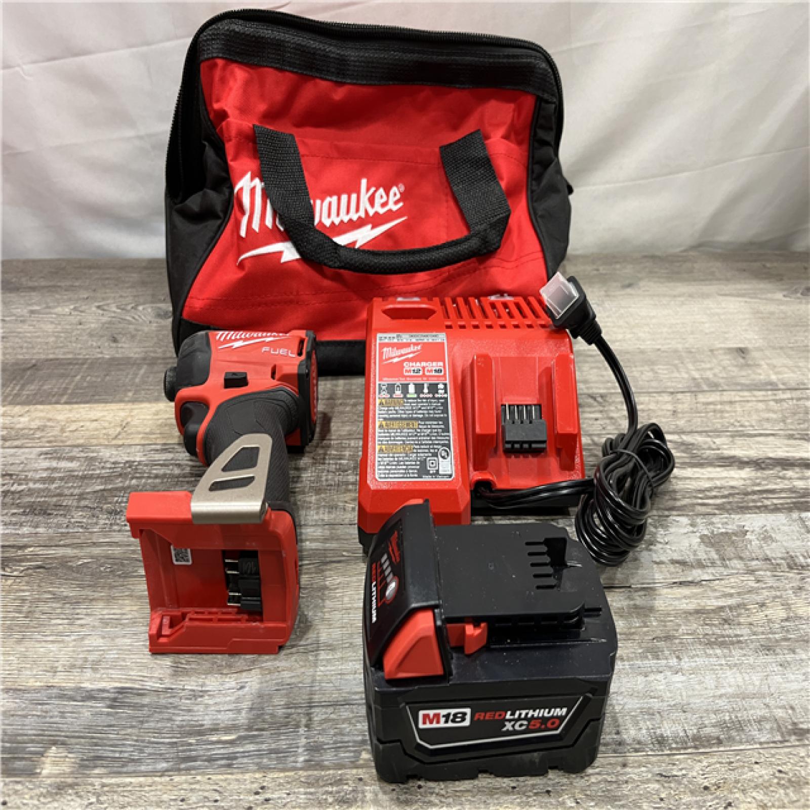 AS-IS Milwaukee FUEL SURGE 18V Lithium-Ion Brushless Cordless 1/4 in. Hex Impact Driver Kit