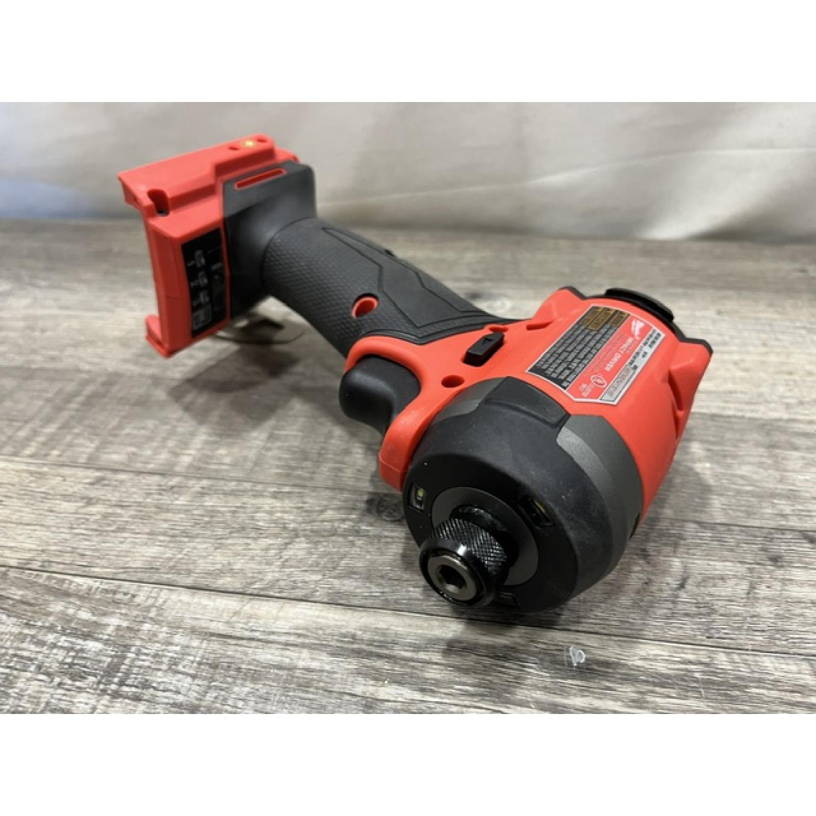 AS-IS Milwaukee FUEL 18V Lithium-Ion Brushless Cordless 1/4 in. Hex Impact Driver (Tool-Only)