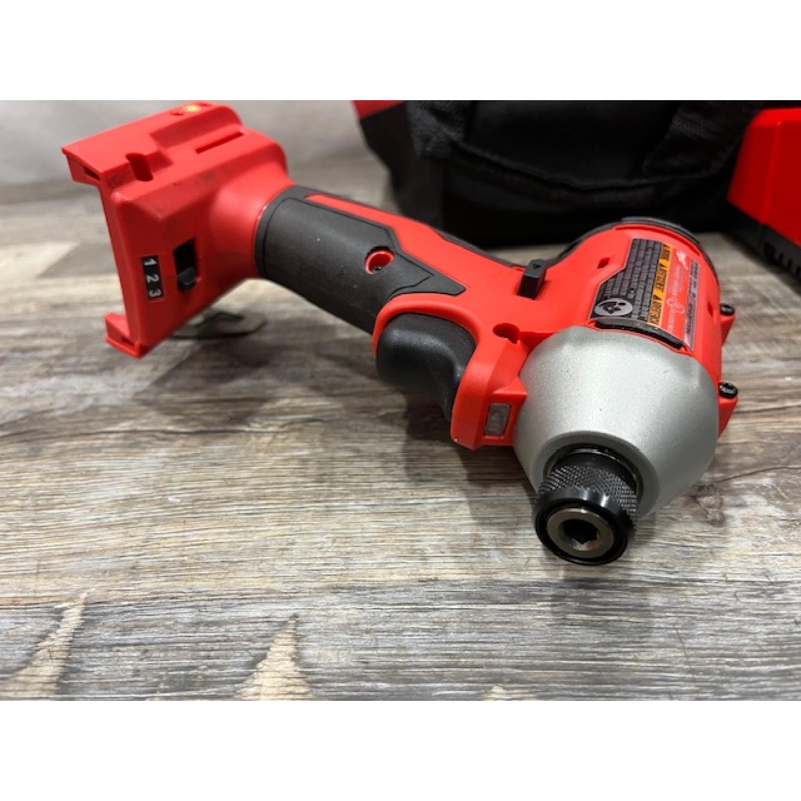 AS-IS Milwaukee 18V Lithium-Ion Compact Brushless Cordless 1/4 in. Impact Driver Kit