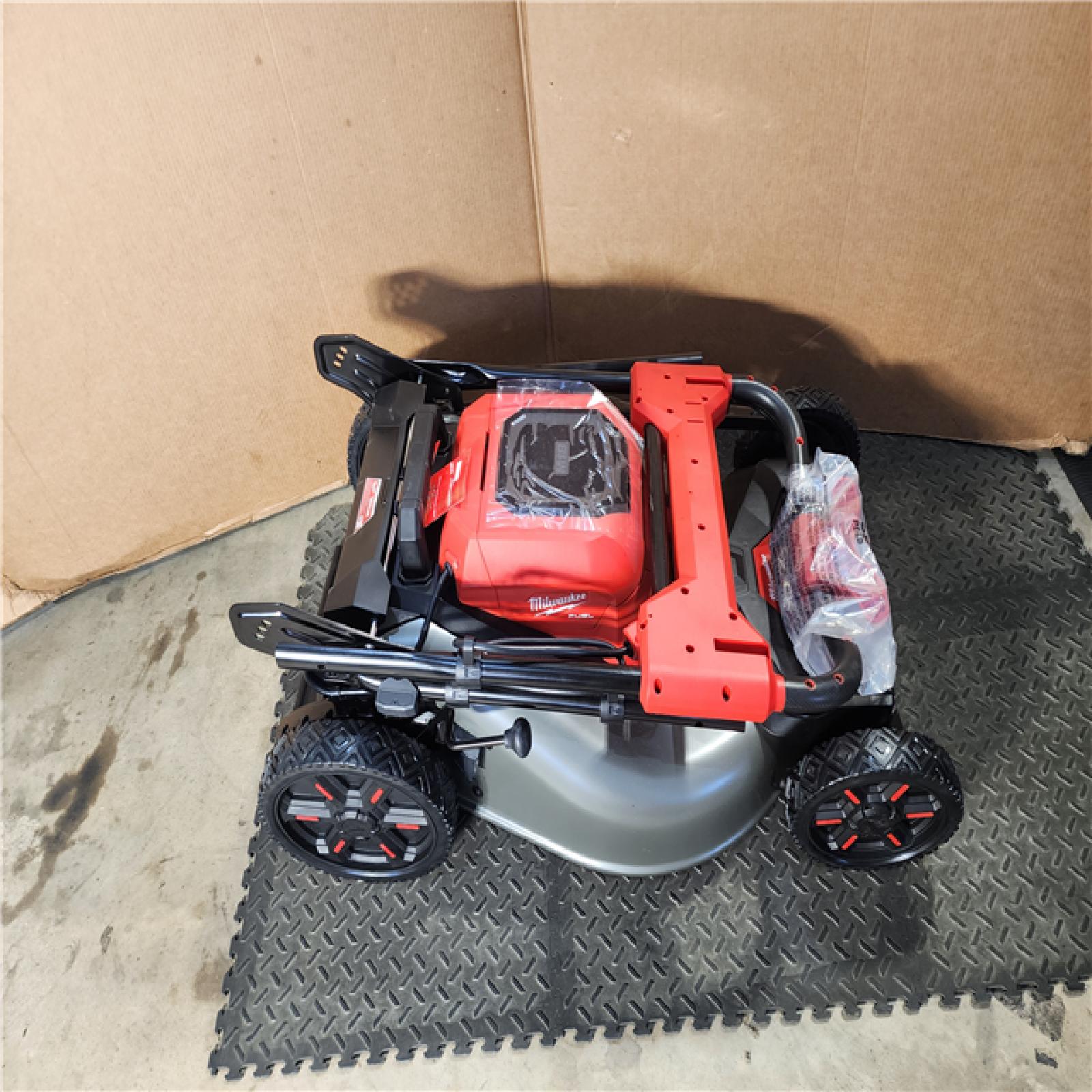 HOUSTON LOCATION - AS-IS M18 FUEL Brushless Cordless 21 in. Walk Behind Dual Battery Self-Propelled Mower W/ Rapid Charger