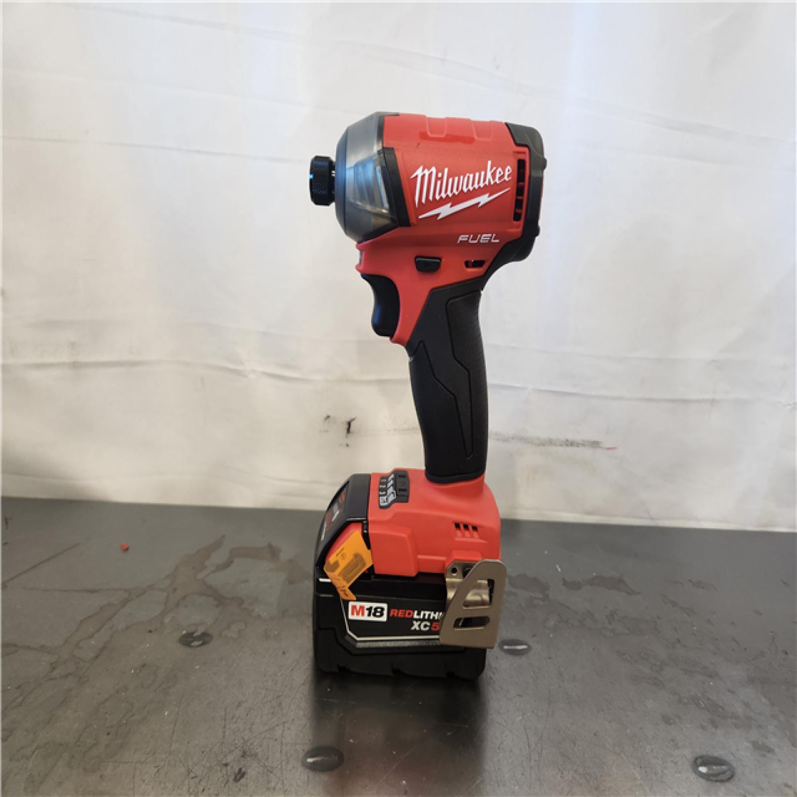 AS-IS- Milwaukee M18 FUEL SURGE 18-Volt Lithium-Ion Brushless Cordless 1/4 in. Hex Impact Driver Compact Kit with Two 5.0 Ah Batteries