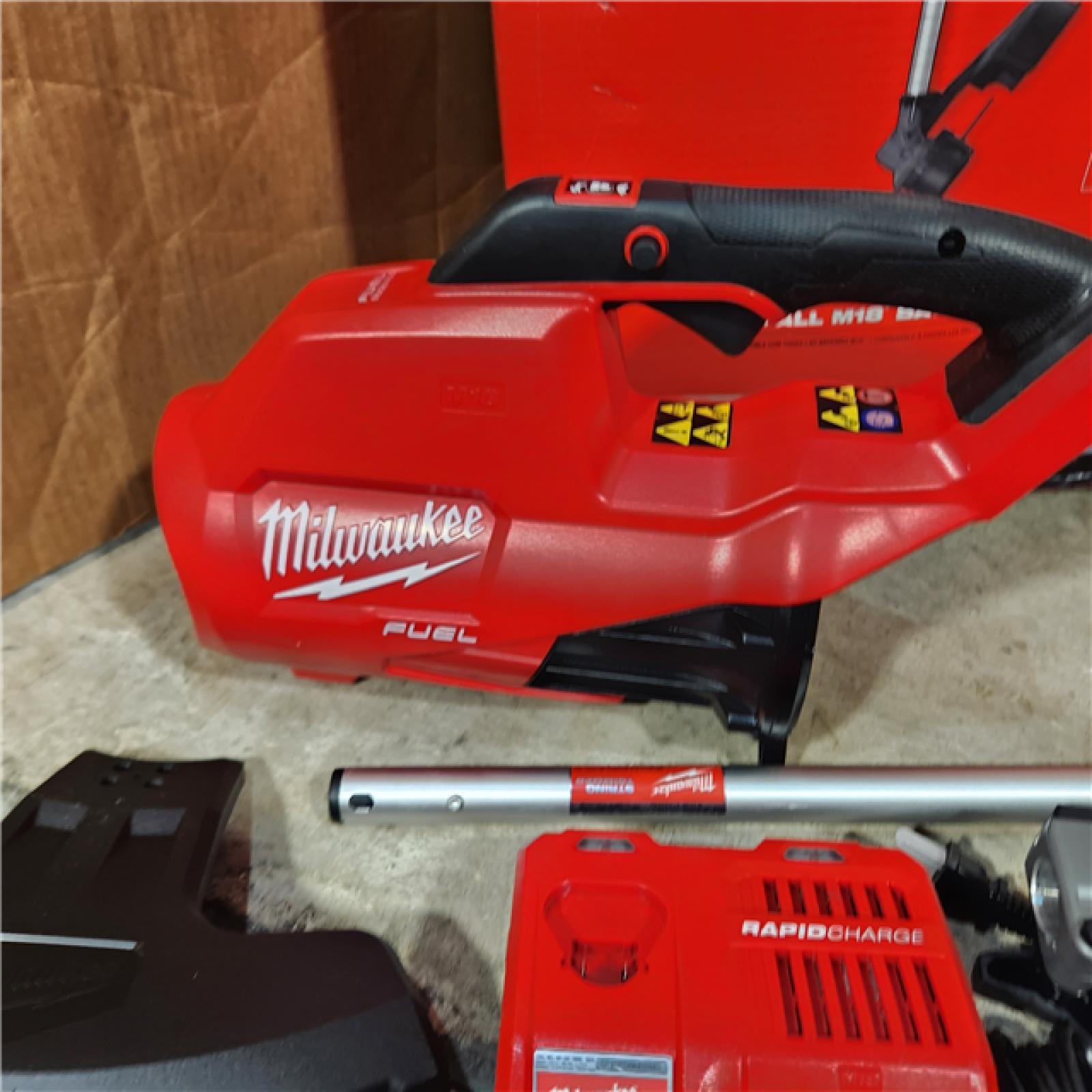 Houston Location- AS-IS Milwaukee 3000-21 M18 FUEL Trimmer and Blower Combo Kit - Appears IN NEW CONDITION)