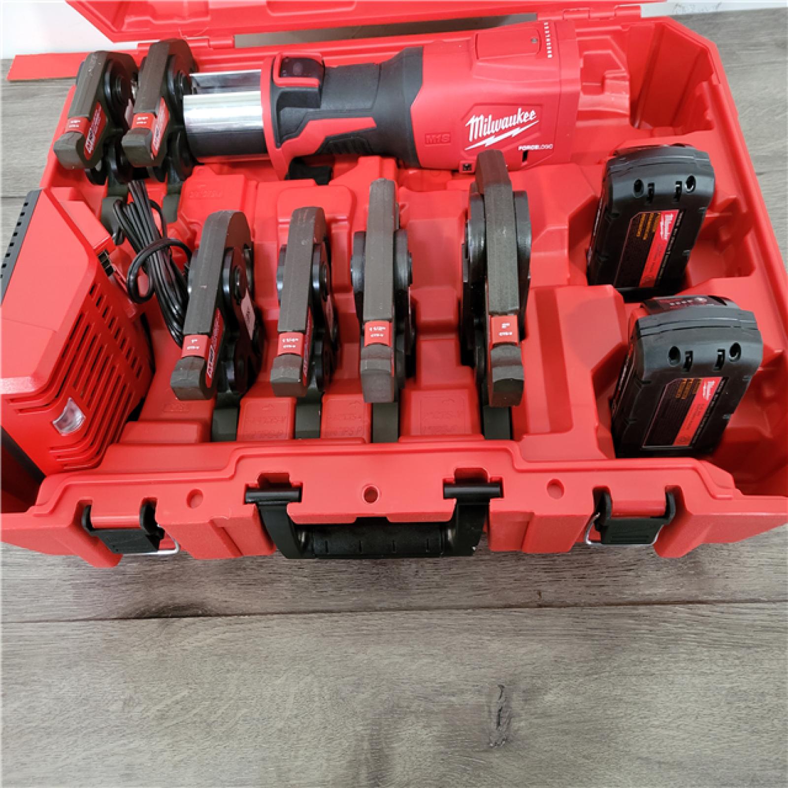 CALIFORNIA AS-IS MILWUAKEE FORCE LOGIC M18 PRESS TOOL KIT  INCLUDES (2) BATTERIES  CHRAGER & HARDCASE