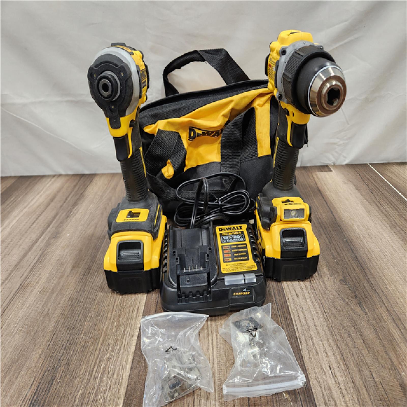 AS-IS DEWALT 20V MAX XR Hammer Drill and ATOMIC Impact Driver 2 Tool Cordless Combo Kit with (2) 4.0Ah Batteries, Charger, and Bag