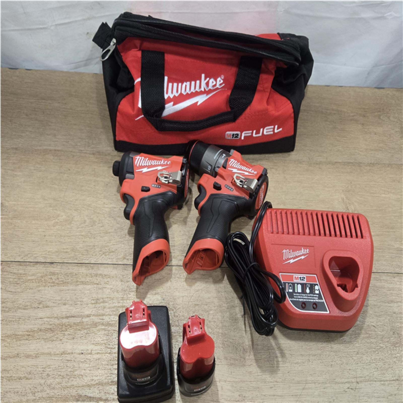 AS-IS Milwaukee FUEL 12-Volt Lithium-Ion Brushless Cordless Hammer Drill and Impact Driver Combo Kit