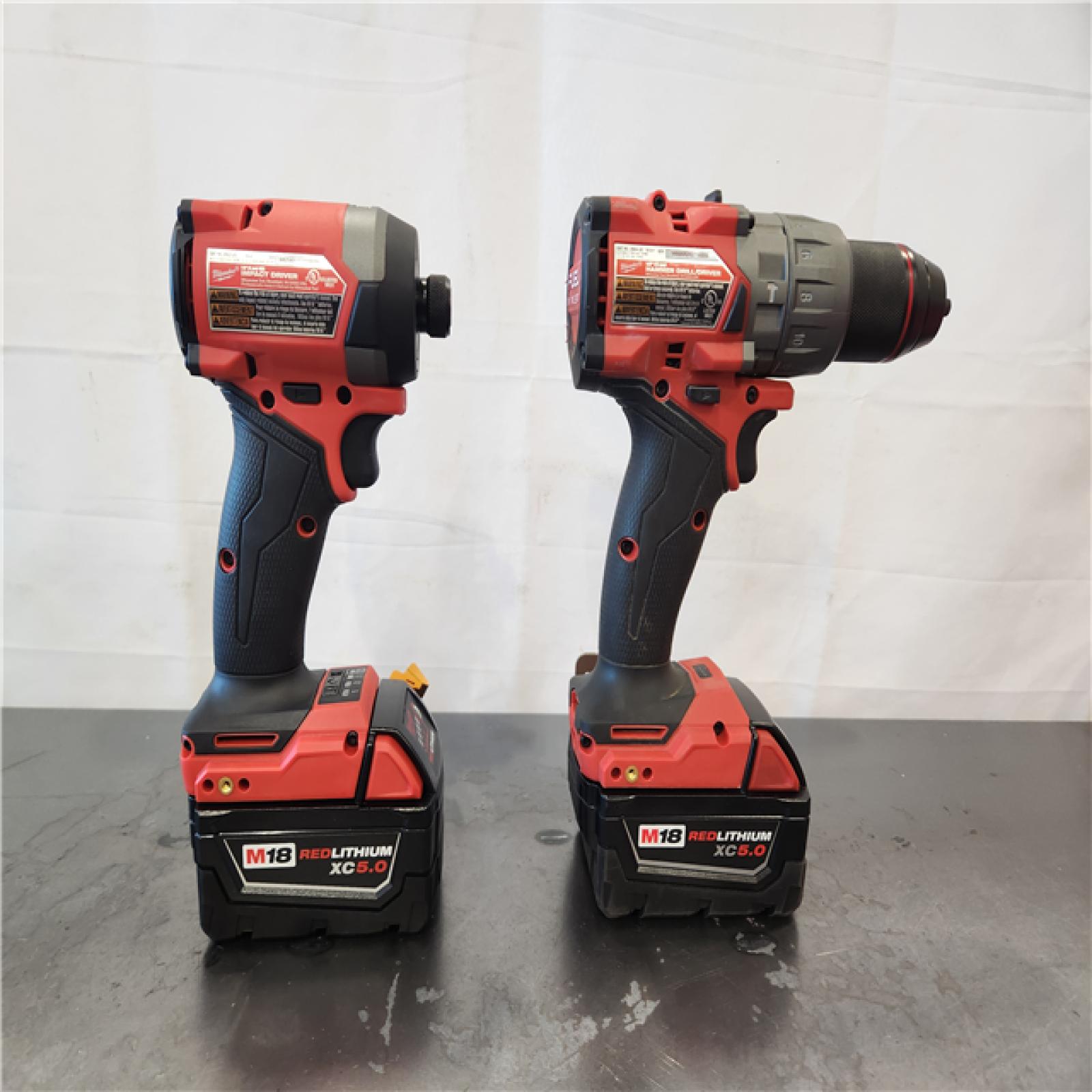AS-IS- Milwaukee FUEL 18V Lithium-Ion Brushless Cordless Hammer Drill and Impact Driver Combo Kit