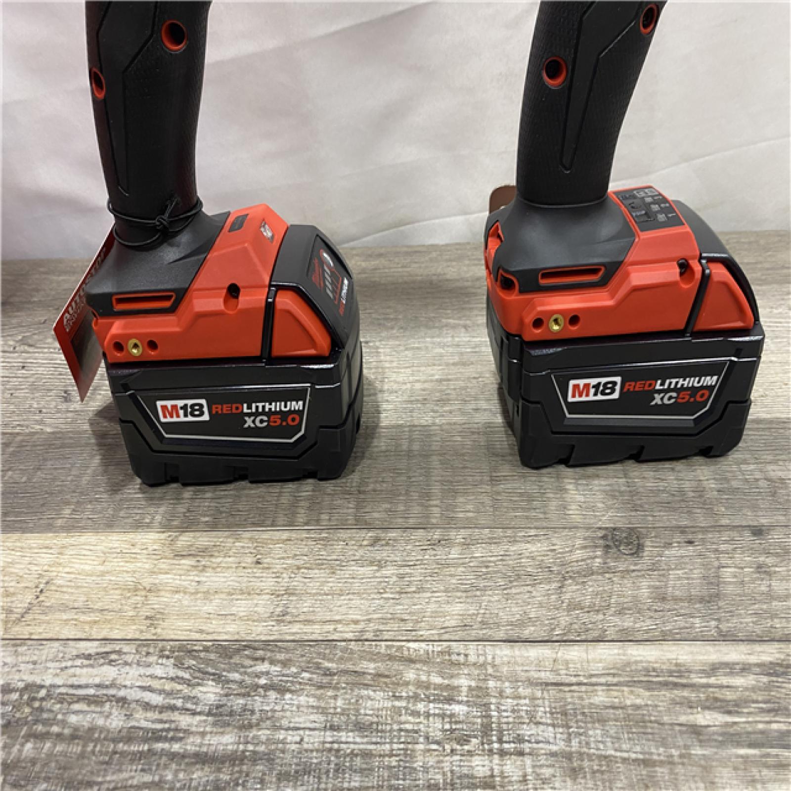 LIKE NEW - Milwaukee  FUEL 18V Lithium-Ion Brushless Cordless Hammer Drill and Impact Driver Combo Kit