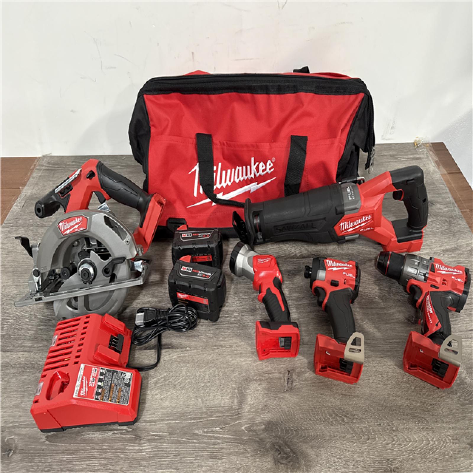 California AS-IS Milwaukee M18 Fuel 5-Tool Combo Kit  Includes (2) Batteries  Charger & Bag
