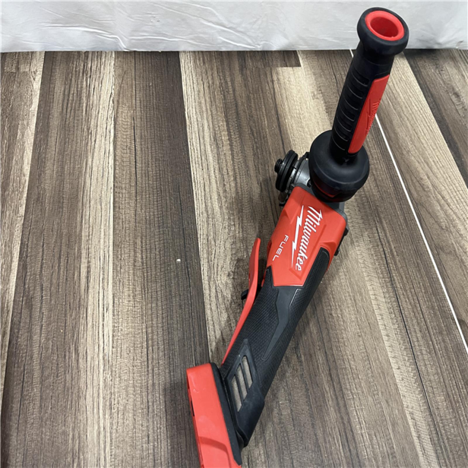 GOOD Milwaukee 2880-20 FUEL 18-Volt Lithium-Ion Brushless Cordless 4-1/2 in./5 in. Grinder W/Paddle Switch (Tool-Only)
