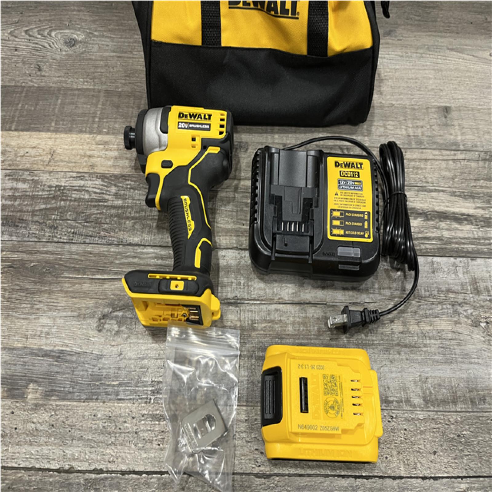 AS-IS DEWALT Atomic 20V Max Lithium-Ion Brushless Cordless Compact 1/4 in. Impact Driver Kit