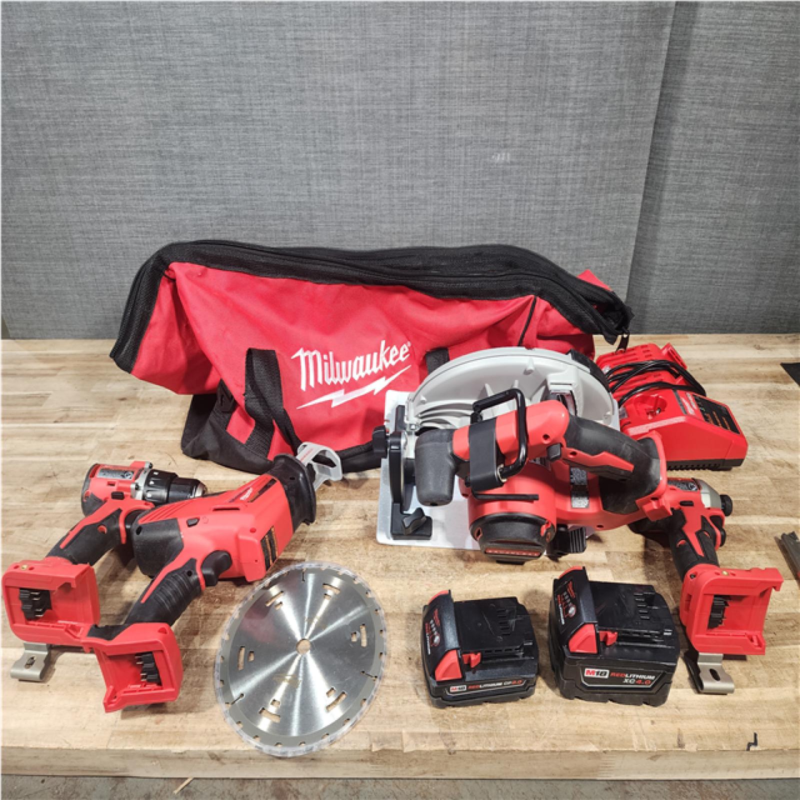 Houston Location AS-IS Milwaukee Circular Saw and Drill and Impact and Hackzall and Batteries QTY/2 with Charger