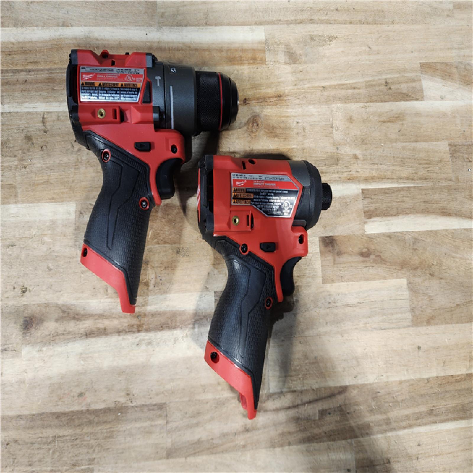 HOUSTON LOCATION - AS-IS Milwaukee FUEL 12-Volt Lithium-Ion Brushless Cordless Hammer Drill and Impact Driver Combo Kit