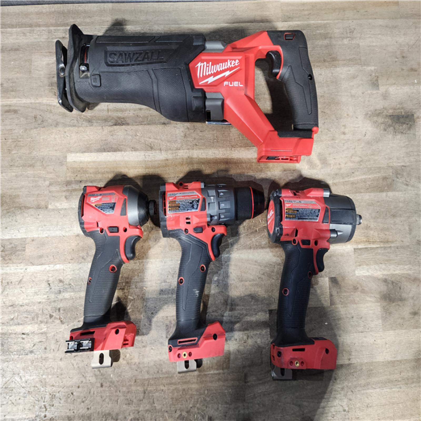 HOUSTON LOCATION - AS-IS MILWAUKEE 4 TOOL COMBO KIT W/ (2) BATTERY & CHARGER