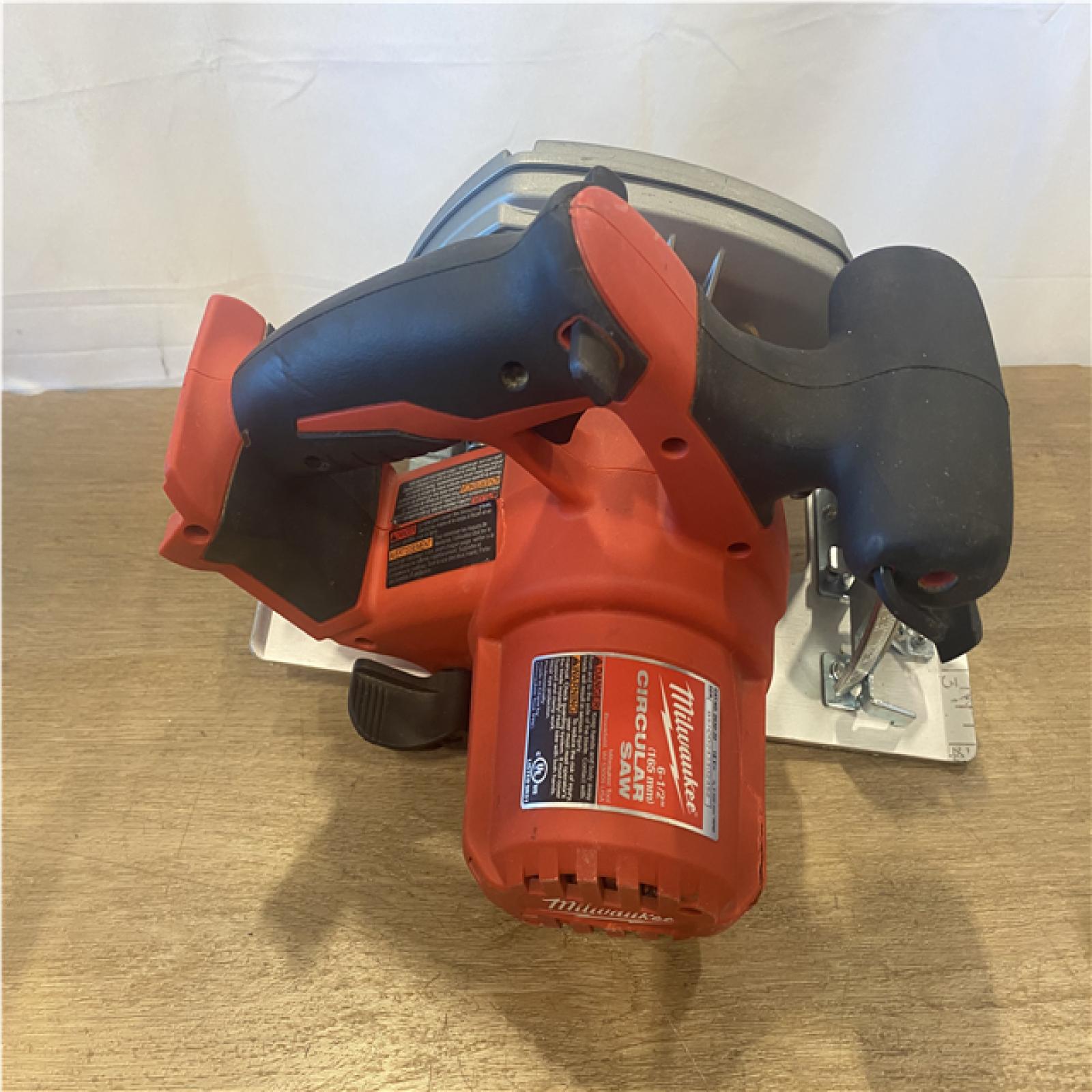 AS-IS Milwaukee 18V Lithium-Ion Cordless 6-1/2 in. Circular Saw (Tool-Only)