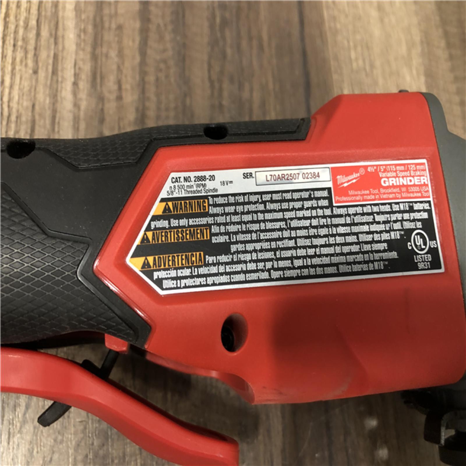 AS-IS Milwaukee FUEL 18V Lithium-Ion Brushless Cordless 4-1/2 in./5 in. Grinder with Variable Speed & Paddle Switch (Tool-Only)