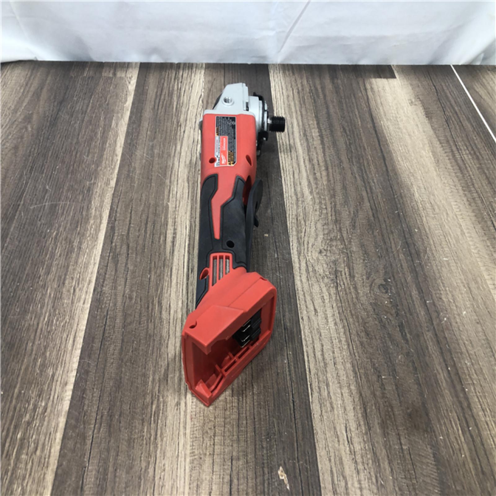 AS-IS Milwaukee 18V Lithium-Ion Brushless Cordless 4-1/2 in./5 in. Grinder w/Paddle Switch (Tool-Only)