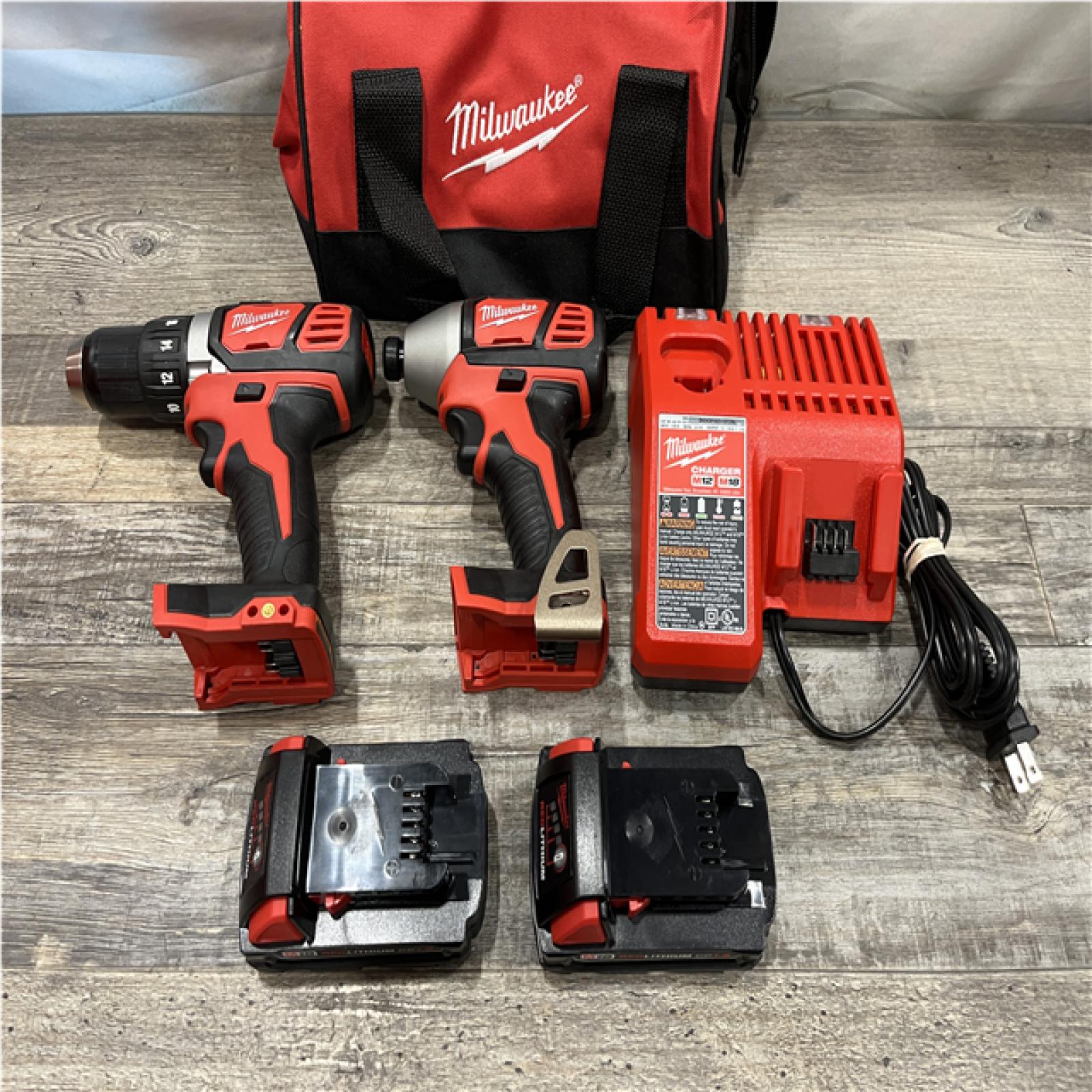 AS-IS Milwaukee 18V Lithium-Ion Cordless Drill Driver/Impact Driver Combo Kit