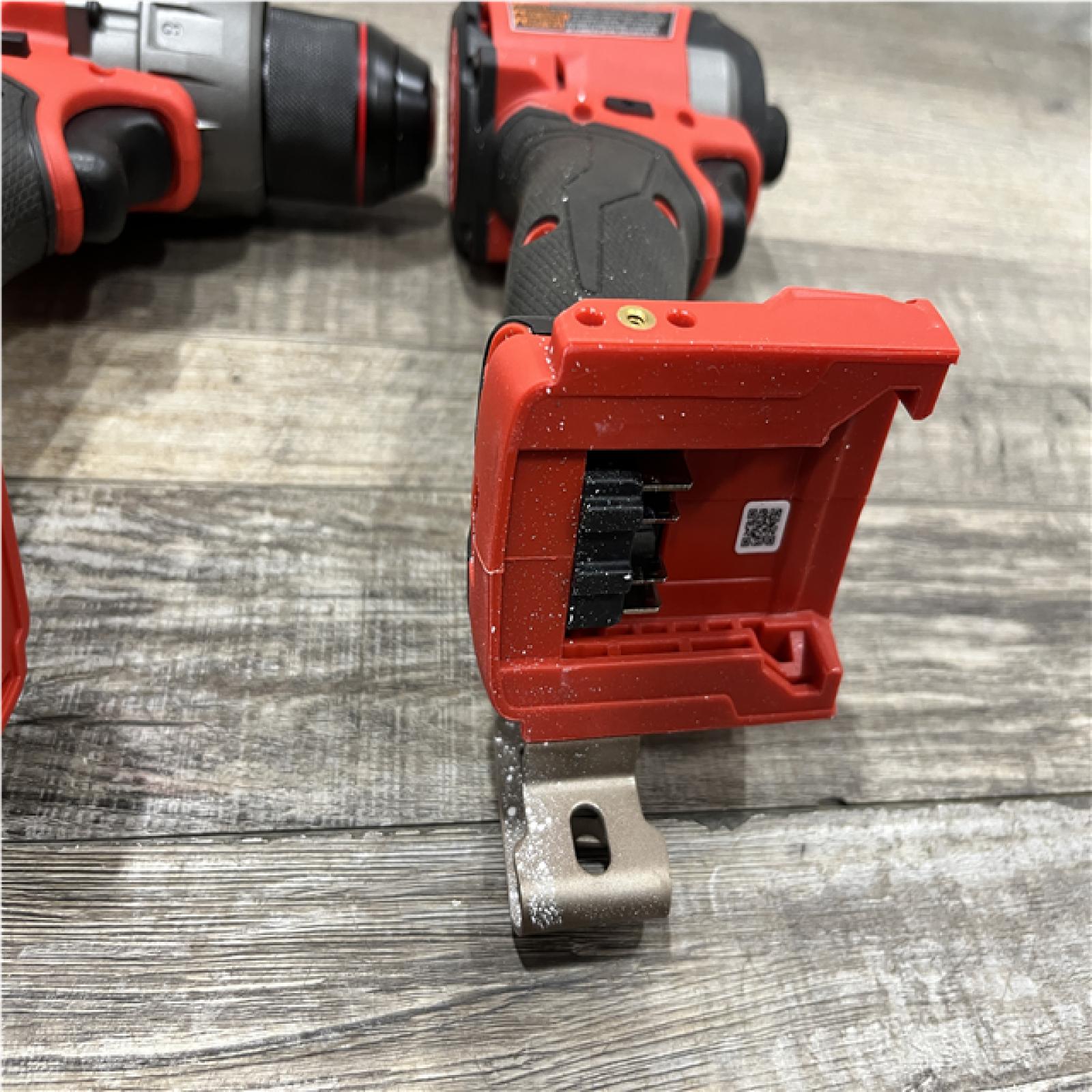 AS-IS Milwaukee FUEL 18V Lithium-Ion Brushless Cordless Hammer Drill and Impact Driver Combo Kit