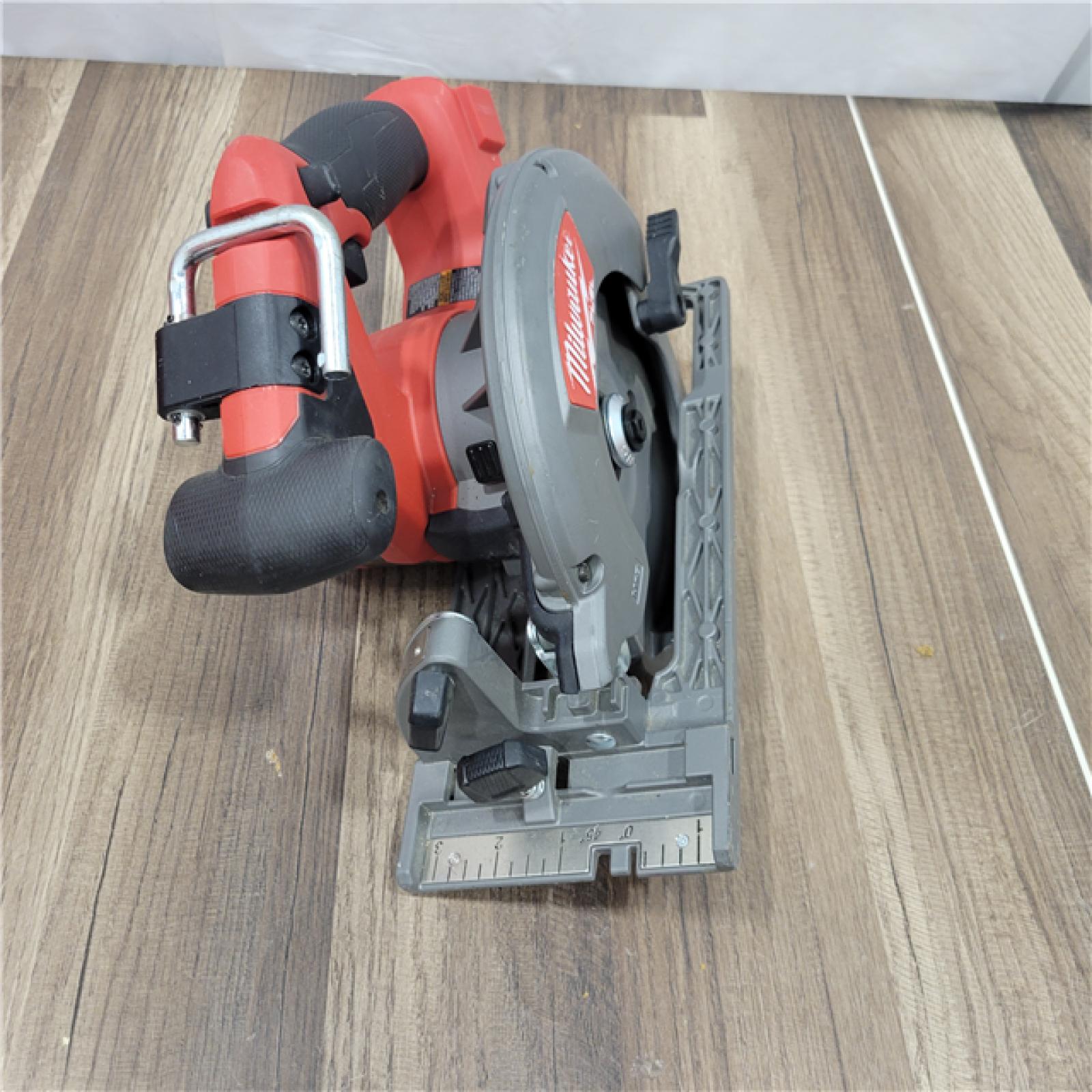 AS-IS Milwaukee M18 FUEL 18V Lithium-Ion Brushless Cordless 6-1/2 in. Circular Saw (Tool-Only)