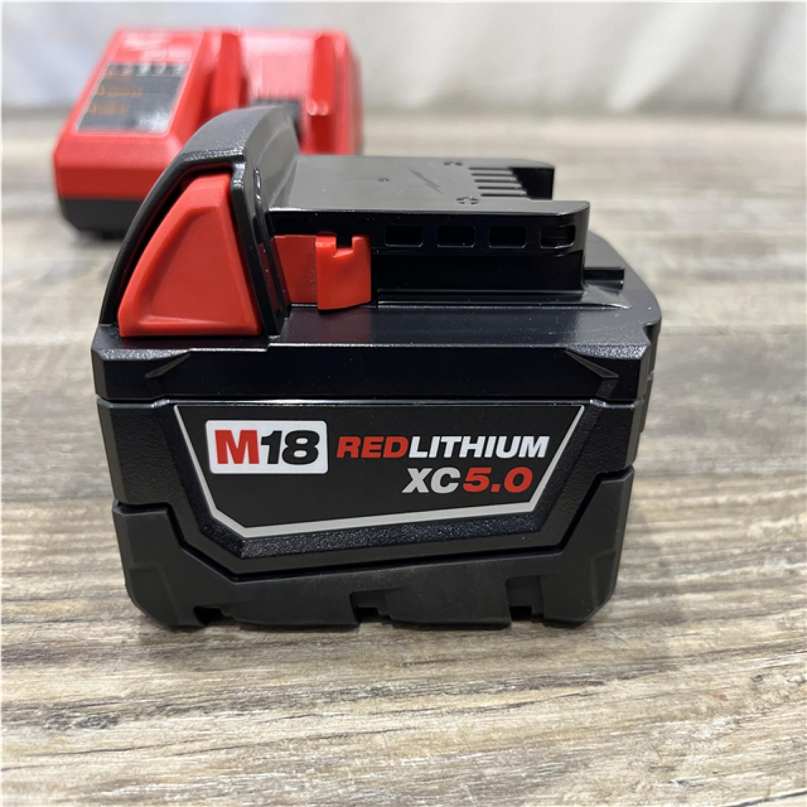 AS-IS Milwaukee 18-Volt Lithium-Ion XC Starter Kit with One 5.0Ah Battery and Charger