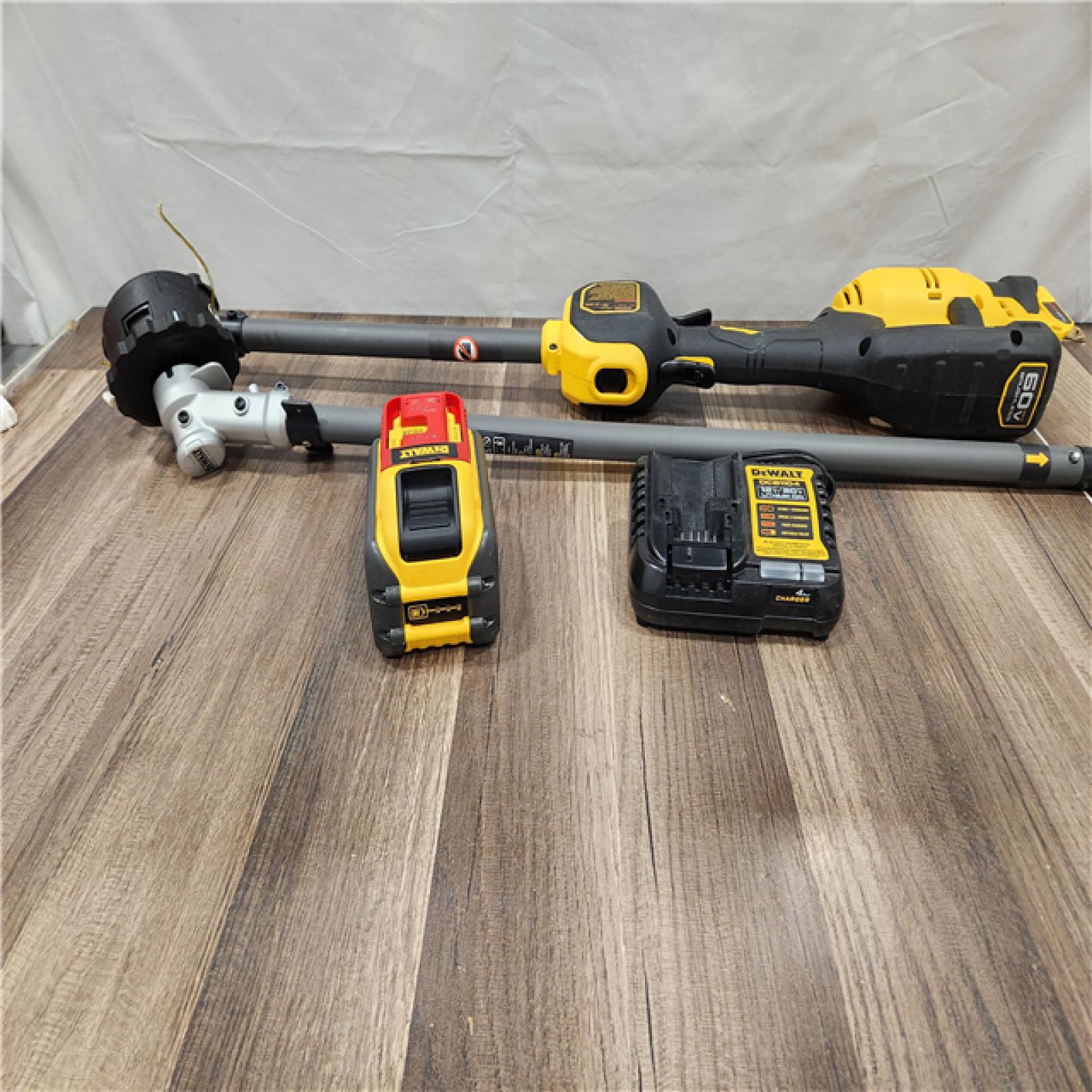 AS-IS DEWALT FLEXVOLT 60V MAX 17 in. Cordless Battery Powered Attachment Capable Trimmer Kit with (1) FLEXVOLT 3Ah Battery & Charger