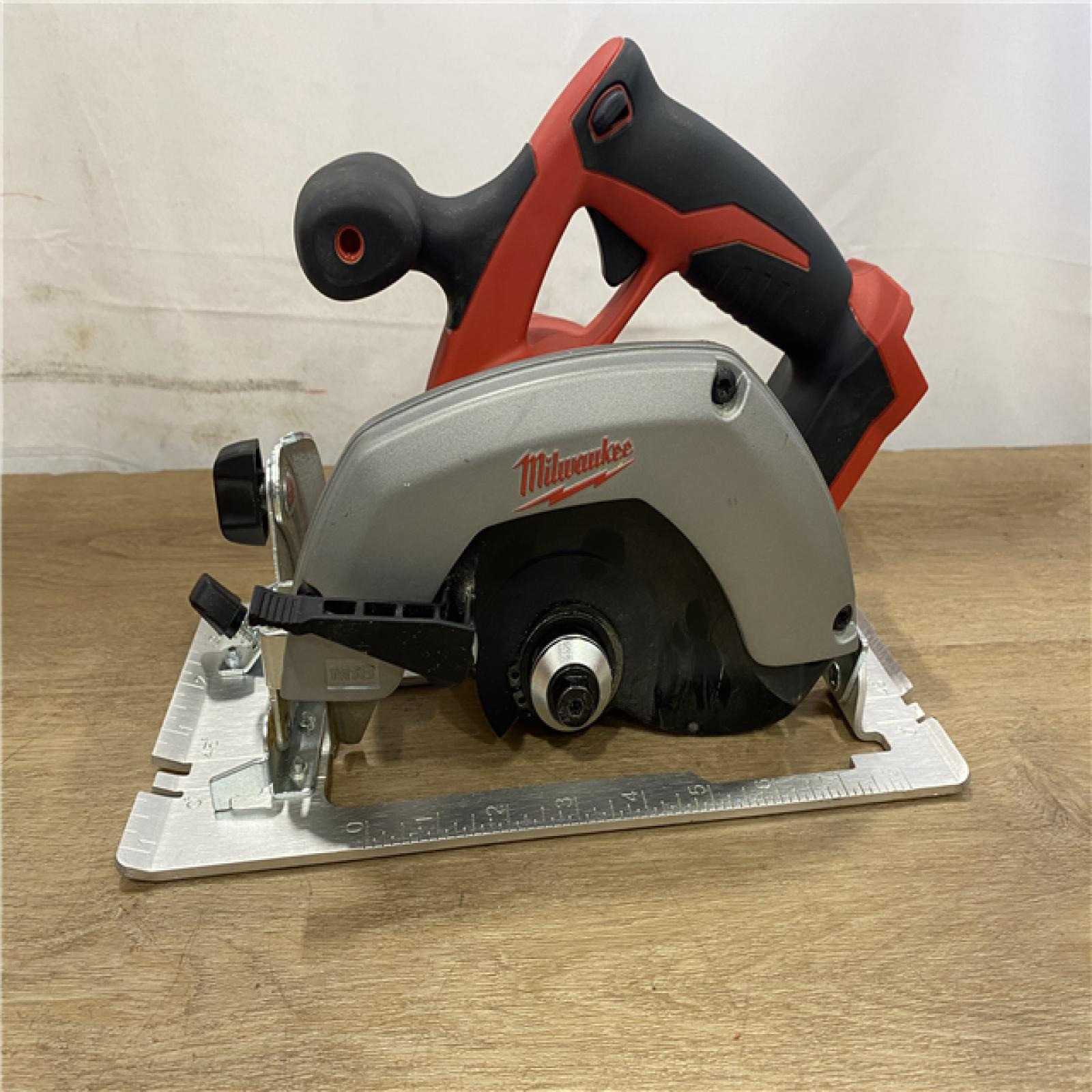 AS-IS Milwaukee 18V Lithium-Ion Cordless 6-1/2 in. Circular Saw (Tool-Only)